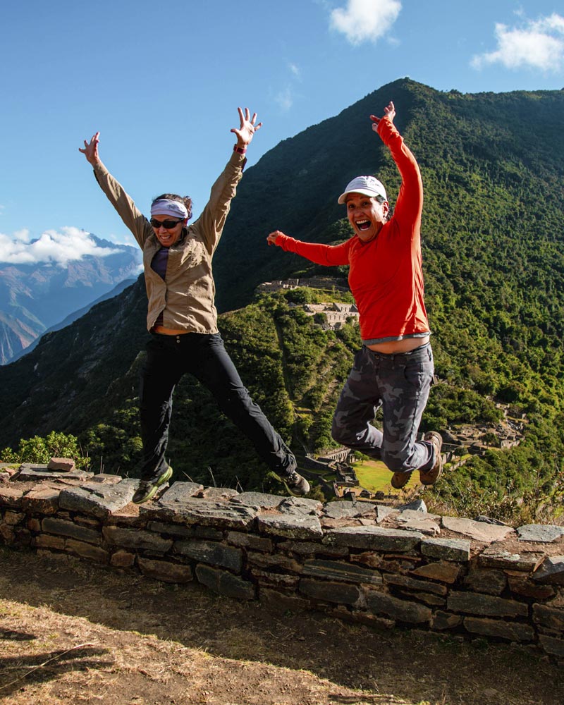 How Many Days Do You Need? Every Version Of The Choquequirao Trek Explained 4 Happy tourists inside Choquequirao jumping into the air