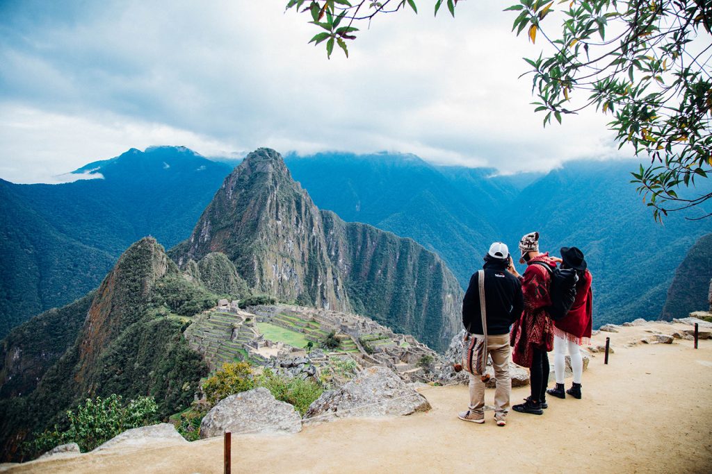 How Many Days Do You Need? Every Version Of The Choquequirao Trek Explained 3 Portrait of visitors at Machu Picchu