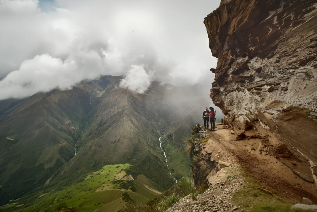 Sacred Toponymy: What “Choquequirao” Really Means And Why It Matters Today 3 Hikers on the ancient road of Choquequirao to Machu Picchu