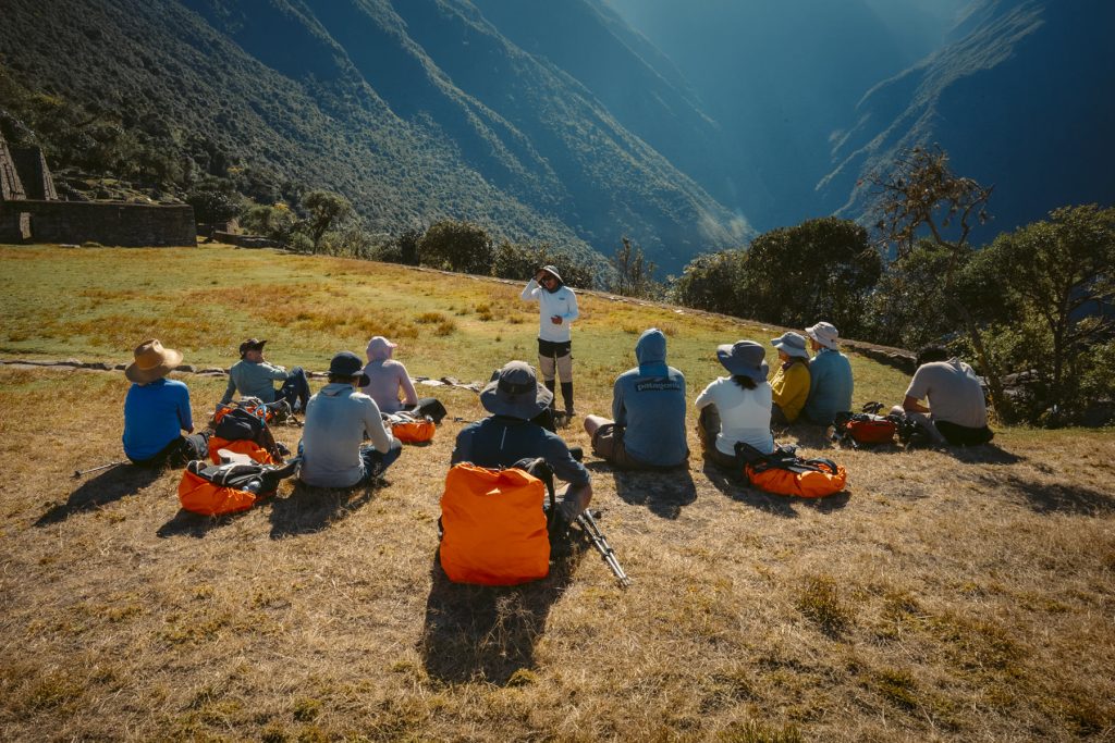 Best Time To Hike The Choquequirao Trek: Weather, Tips & Expert Recommendations 3 Tour group on Choquequirao Trek listening to their guide.